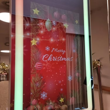 Photo Mirror Booth twinkling bright at a Christmas Celebration in Redlandbay, Redlands - party hire by SweetAz Co.