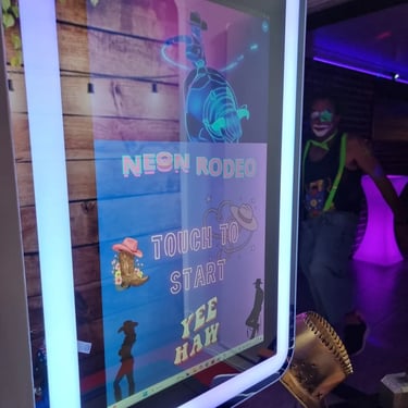Photo Booth welcome screen dancing neon rodeo at a New Years party in Redlandbay, Redlands - party hire by SweetAz Co.
