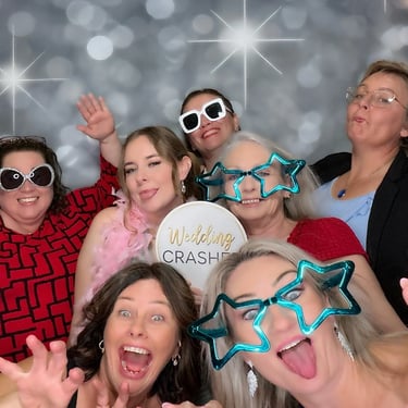 Photo Booth guests have fun making memories at a Wedding Party in Currumbin, Gold Coast - party hire by SweetAz Co.
