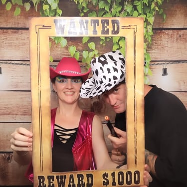Photo Booth snapping neon cowboy moments at a Year End Party in Redlandbay, Redlands - party hire by SweetAz Co.