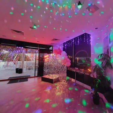 Silver Shimmer Wall installed for a 18Th Birthday in Kangaroopoint, Brisbane - party hire by SweetAz Co.