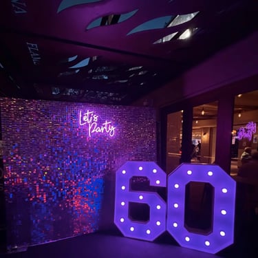 Shimmer Wall glistening during a 60th Event in Currumbin, Gold Coast - party hire by SweetAz Co.