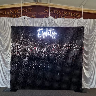 Shimmer Wall in stunning black with eighty neon sign at an 80th Birthday in Carina, Brisbane - party hire by SweetAz Co.