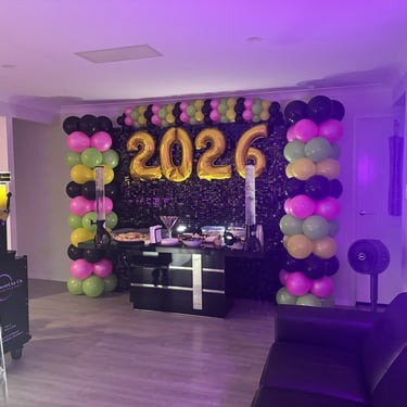 Shimmer Wall and balloon garland during a new Years party in Redlandbay, Redlands - party hire by SweetAz Co.