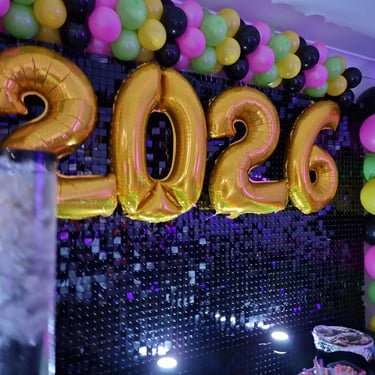Shimmer Wall with 2026 balloons at a New Years party in Redlandbay, Redlands - party hire by SweetAz Co.