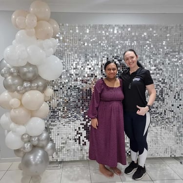 Carly with Denise's sister who organised the silver shimmer wall for her graduation, Brisbane.