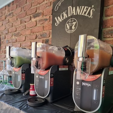 Slushie Machines lined up for cocktails during a 50th Birthday in Tanahmerah, Logan - party hire by SweetAz Co.