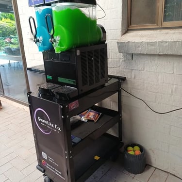 Slushie Machine chilled and ready to go at a birthday Party in Carindale, Brisbane - party hire by SweetAz Co.