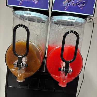 Slushie Machine so popular its nearly all gone at a School Graduation in Capalaba, Redlands - party hire by SweetAz Co.
