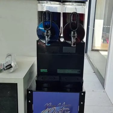Slushie Machine bringing the chills at a Twentyone Birthday in Belmont, Brisbane - party hire by SweetAz Co.