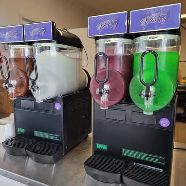 Slushie Machine on the counter icing up at a Xmas Event in Portofbrisbane, Brisbane - party hire by SweetAz Co.