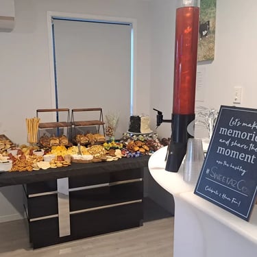 Sweetaz Crew admiring the food table at a 21st Event in Redlandbay, Redlands - party hire by SweetAz Co.
