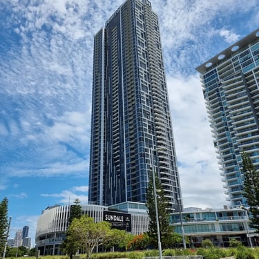 Sweetaz Crew at a concert looking up that the Meriton Building in Southport, Gold Coast - party hire by SweetAz Co.