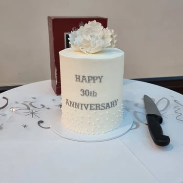 Sweetaz Crew checking out the cake at a Wedding Anniversary in Cornubia, Logan - party hire by SweetAz Co.