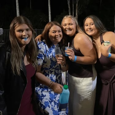 Mum and Stella's friends posing for a photo with their slushie cups in had in Wakerley.