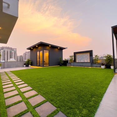 Beautiful terrace garden with pergola and hanging plants