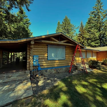 40 years of old stains removed for a fresh coat on this Log Home!