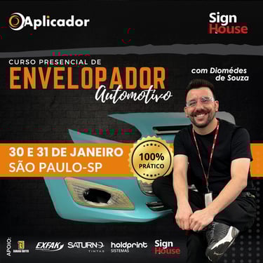 a man sitting on a car with a sign that says,'welcome to me