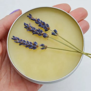 DIY lavender cleansing balm in glass jar with dried lavender flowers