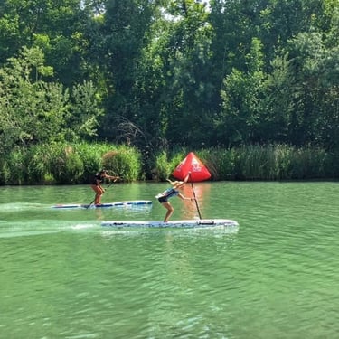 Girs Stan Up Paddling in river