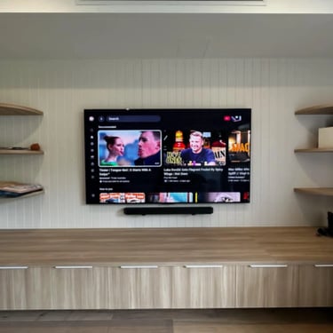 Professional 85 inch LG OLED TV wall mount installation with floating shelf in Brighton Melbourne