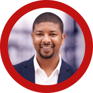 a man in a suit and white shirt