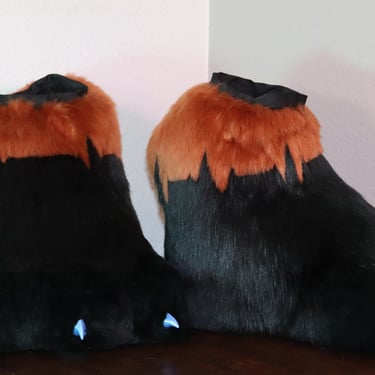 Feet paws made by Teto Creations featuring 3d-printed claws and a detailed EKG pattern