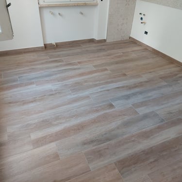 Pavimento finto legno Carrara