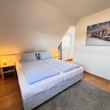 Hotel DunenNest - Kleines Suite, Schlafzimmer, Boxspringbett
