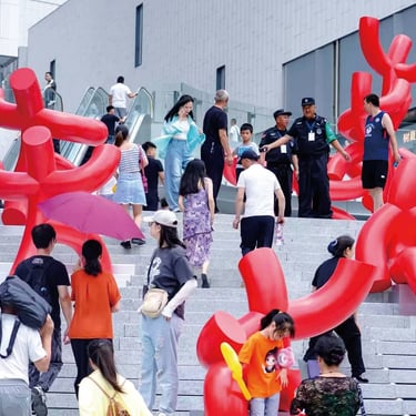 Red Fiberglass Tube-Man Sculptures for Round Tube People Art Exhibition Outdoor Steps in Guiyang by DEFARA