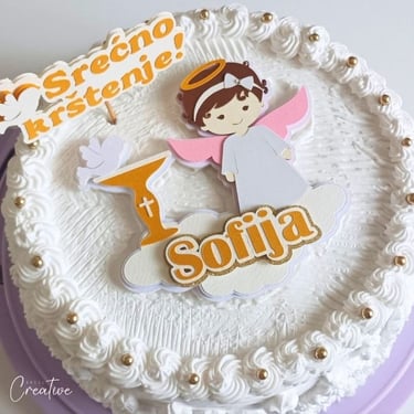 Cake topper on a cake, for a christening of a girl, with a name Sofija on it
