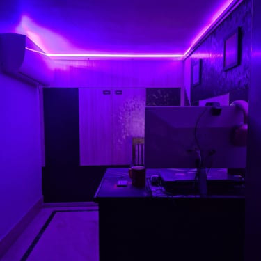 Computer room interior with RGB lighting fitting