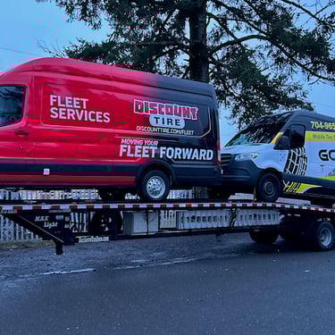 Another Gomobile Tires van shipping out together a a discount tire van