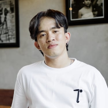 a man in a white shirt and a black and white shirt