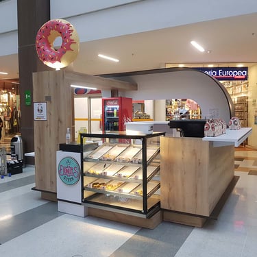 Picture of commercial isle stand designed by White and Wood Custom Carpentry in Orlando Florida