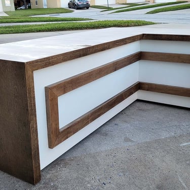 Picture of dinner table bench designed by White and Wood Custom Carpentry in Orlando Florida