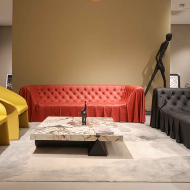 Bold Color Red and Black Sofa with Yellow Leather Chairs