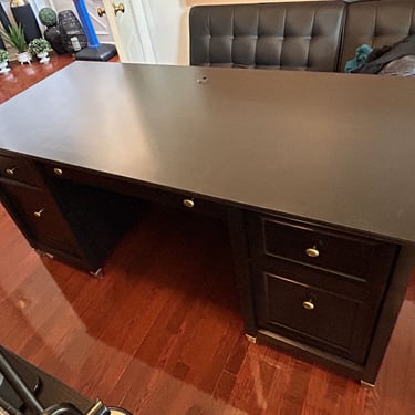 Sauder Edge Water executive desk assembled for a client in North Andover, MA. Estate black with client-enhanced color scheme.