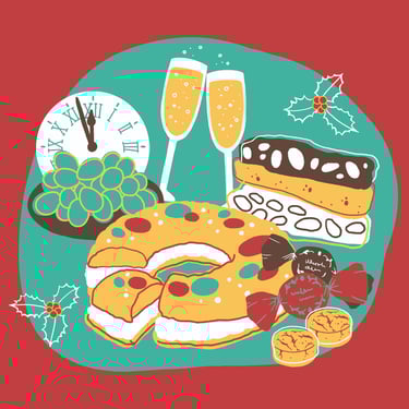 christmas sweets on a table with champagne, turrón, a clock and some grapes