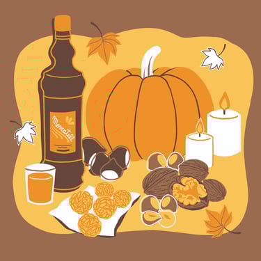 autumn snacks: walnuts, hazelnuts, chestnuts, leaves, a pumpkin and some candles