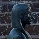 A client with an AMWO SEO specialist in a bright office.