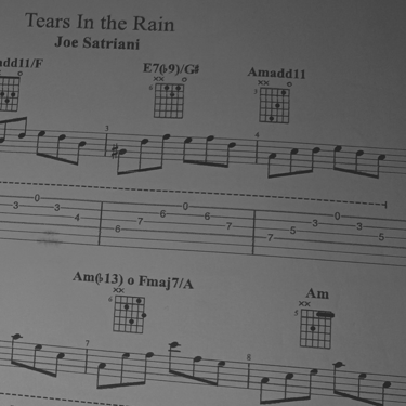 Partitura y tablatura de guitarra: "Tears in the Rain" de Joe Satriani.