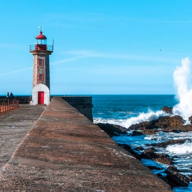 lighthouse with waves