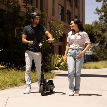 a man and woman standing next to each other