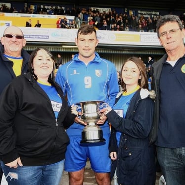 Trev pictured at the presentation of Player of the Year to Matt Rhead in 2014.