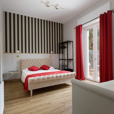 Camera Tripla Deluxe con letto matrimoniale e balcone a Verona.