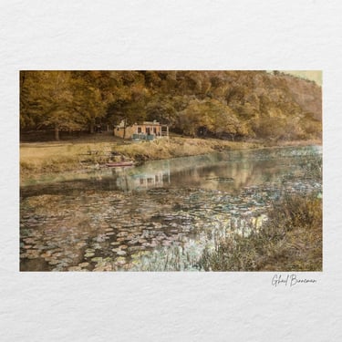 Riverside cottage reflecting in water at Swellendam Art and Photography Retreat in South Africa.
