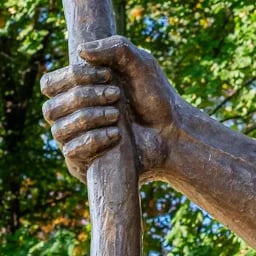 Close up on the hand of Saint Christopher's statue.