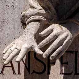 Close-up of Péter Mansfeld's handcuffed hands 