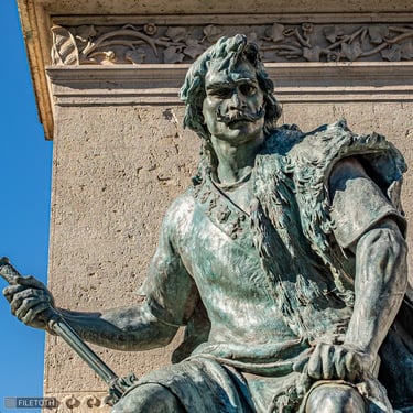 Portrait of Miklós Toldi, male figure on one side of the János Arany monument.